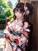 A woman in a kimono sitting on a wooden bench.